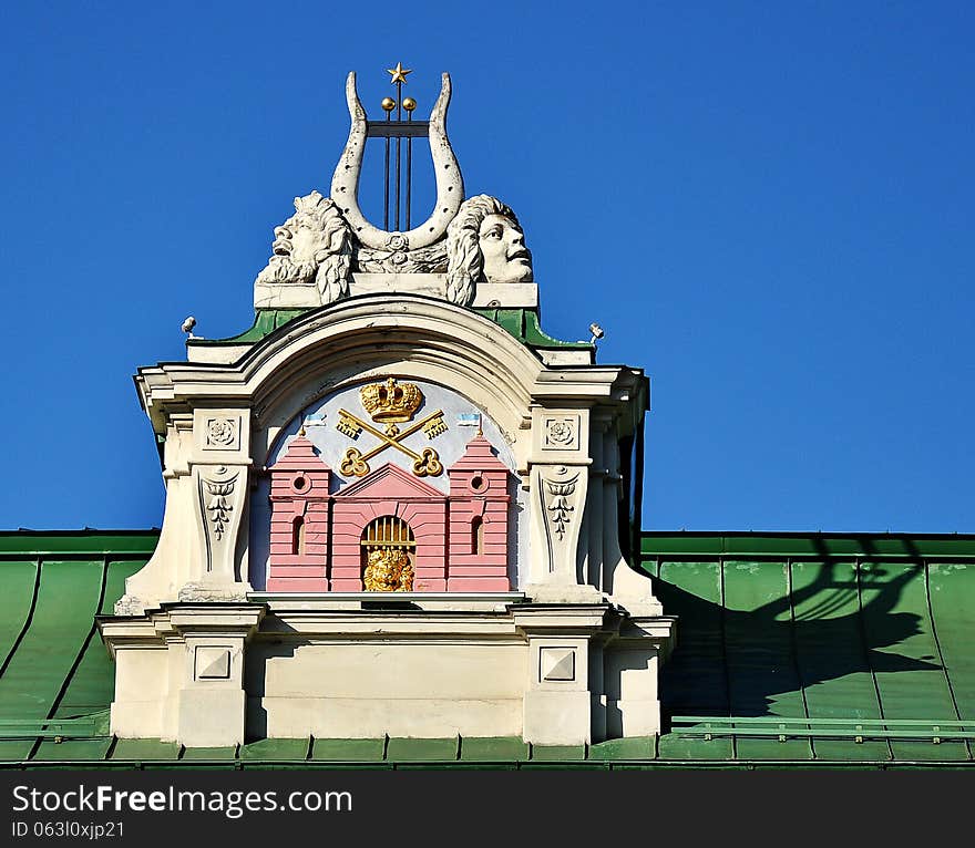 Coat of arms of Latvia, theatrical characters on the roof of the National Theatre, Riga, Latvia. Coat of arms of Latvia, theatrical characters on the roof of the National Theatre, Riga, Latvia