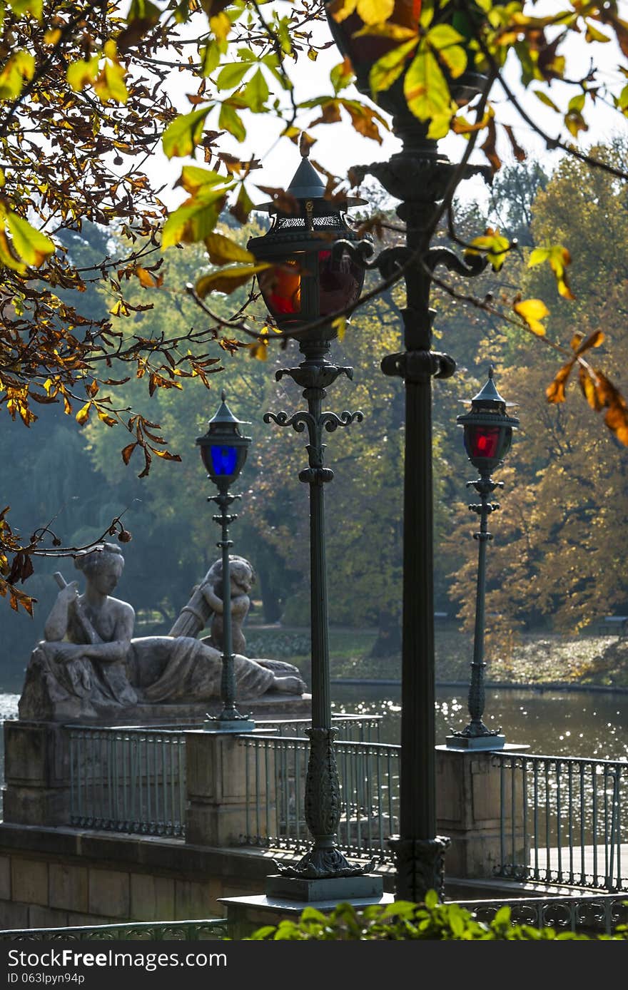 Stylish lanterns and sculptures in Lazienki Krolewskie park, Warsaw