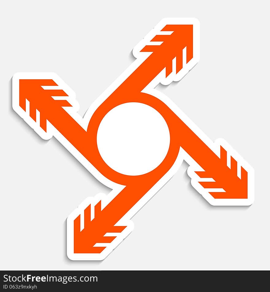 Orange circular object with arrow