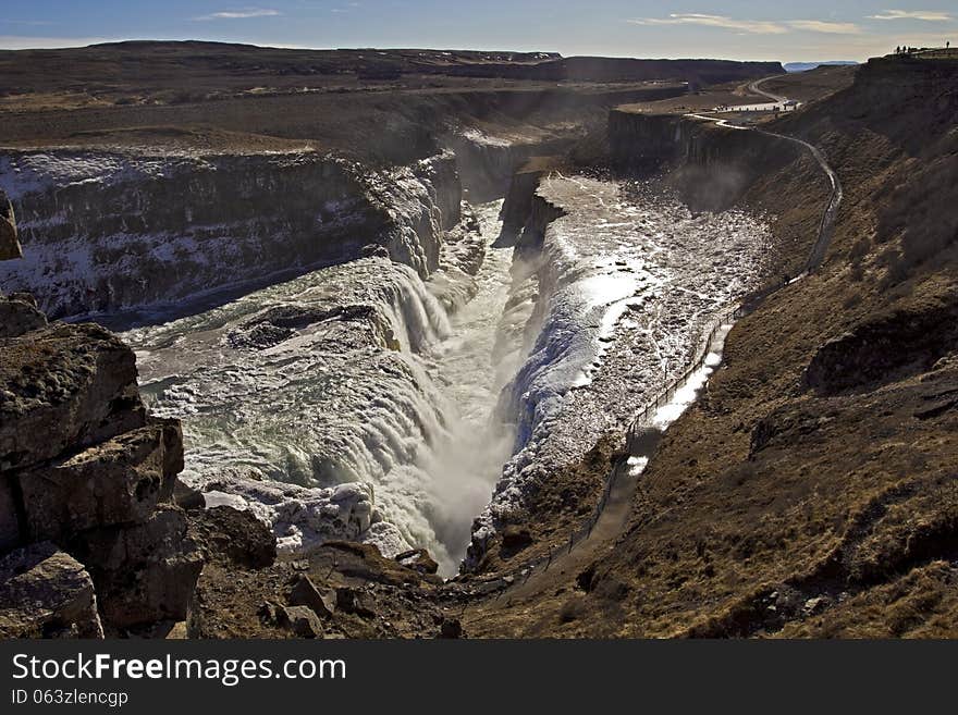 Panorama of the Golden Falls falling into the chasm, Gullfoss waterfall, Iceland.