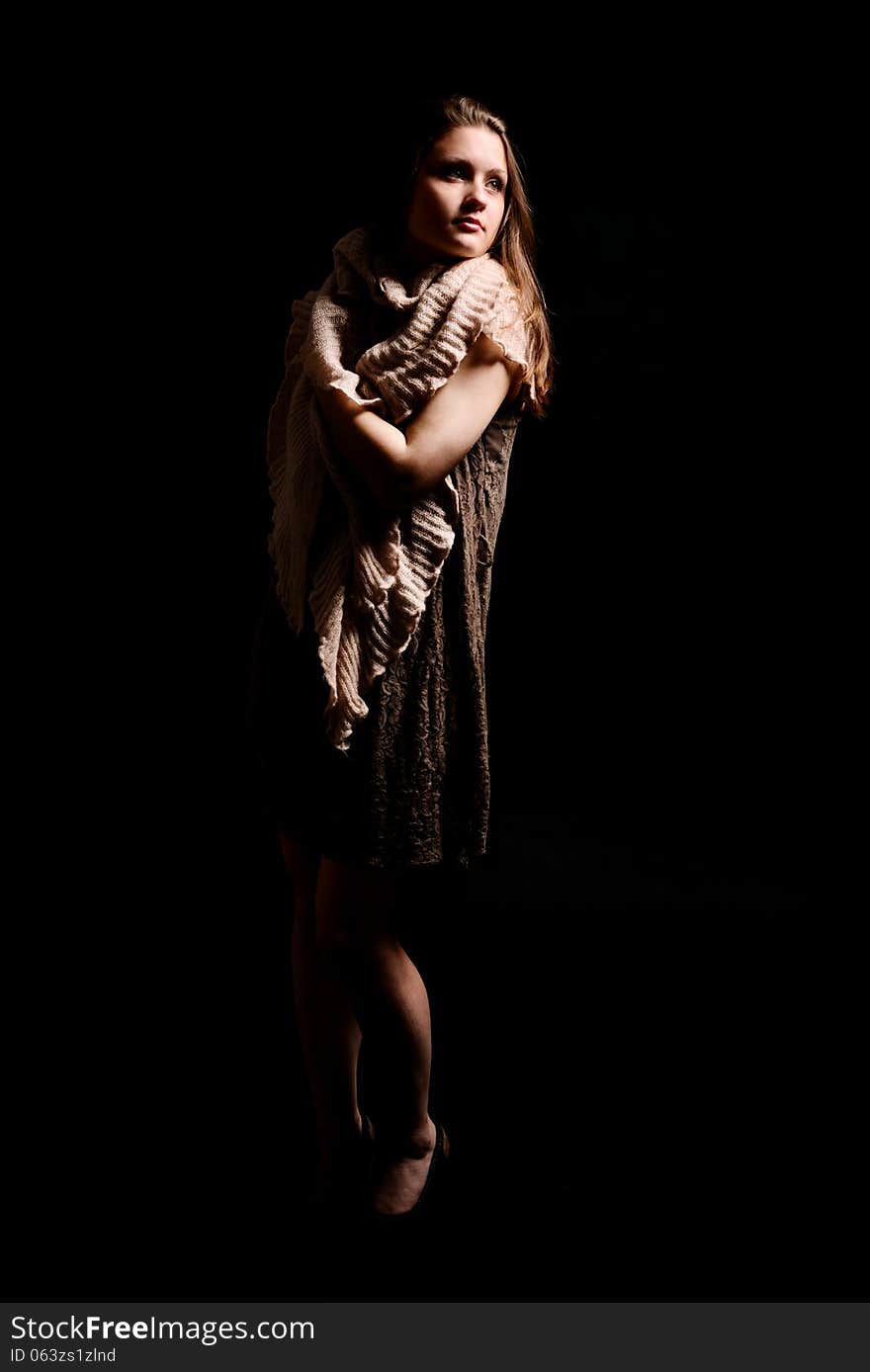 Portrait of young nice sensual girl in studio on black background. Portrait of young nice sensual girl in studio on black background