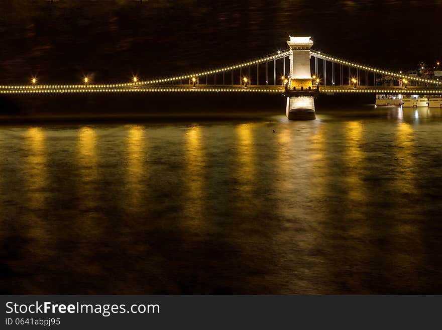 Bridge over river at night