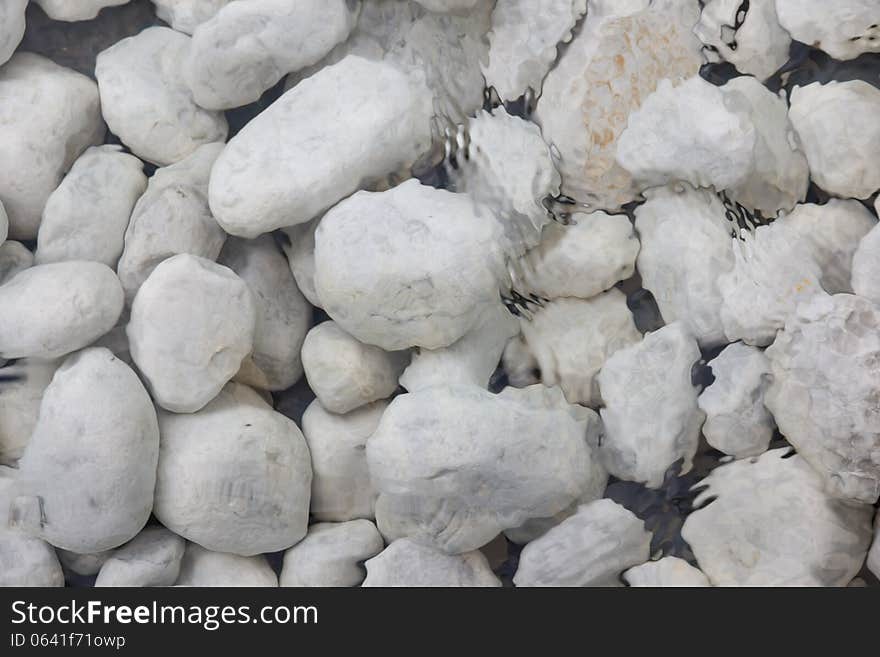 White stones underwater