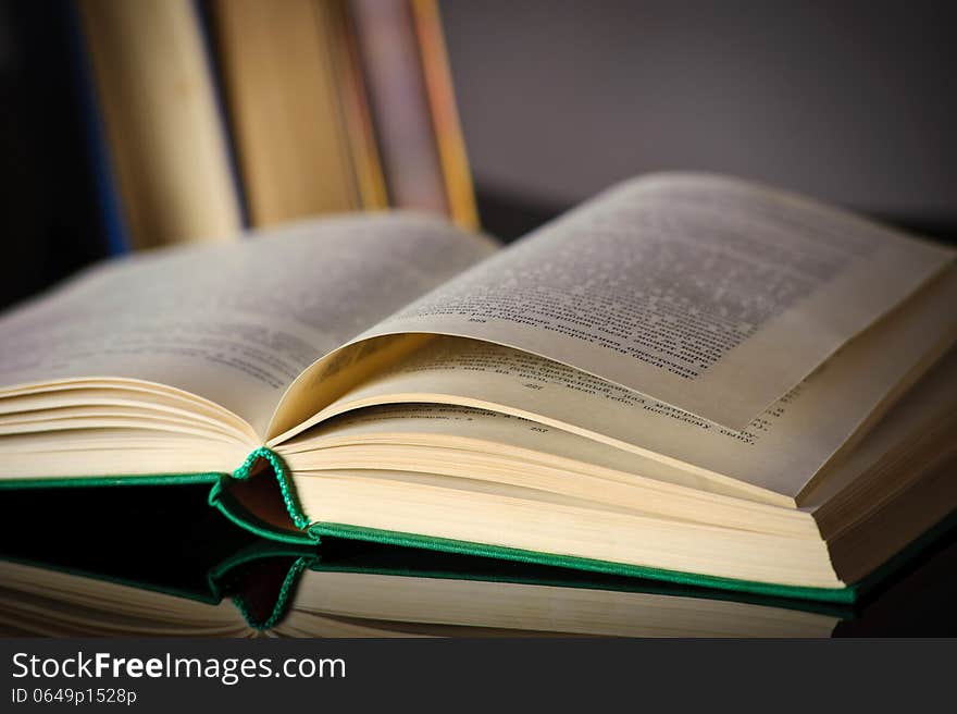 Vintage old books on wooden deck table and grunge background. Vintage old books on wooden deck table and grunge background