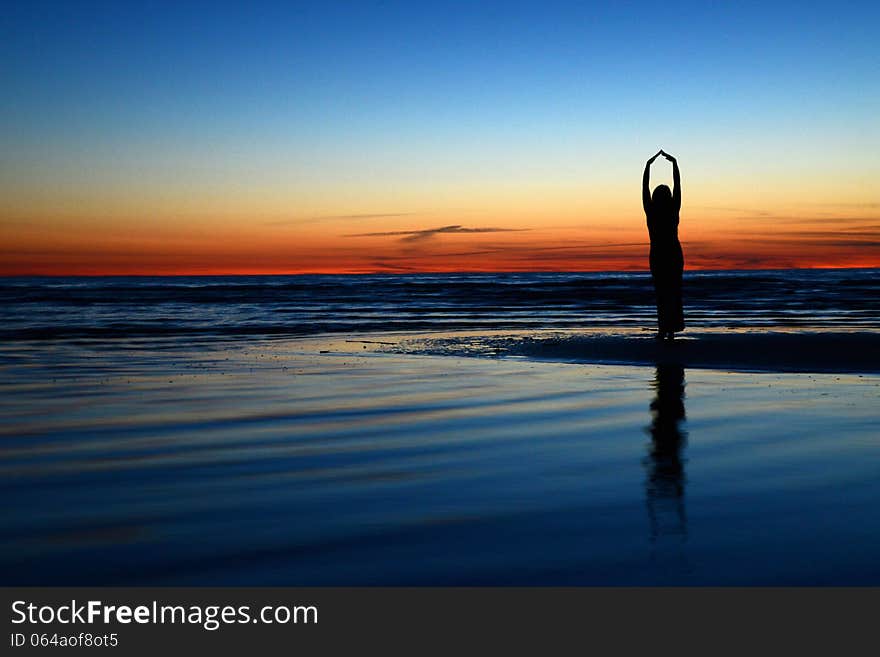 Photo of woman silhouette during the sunset. Photo of woman silhouette during the sunset.