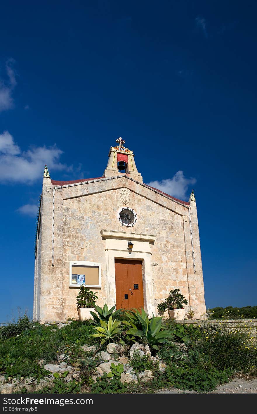 Old Small Church in Malta in cloudy contrast polorize sky background, maltese church, small church on sunset time with nice colorful sky, Malta, catholic church in Malta