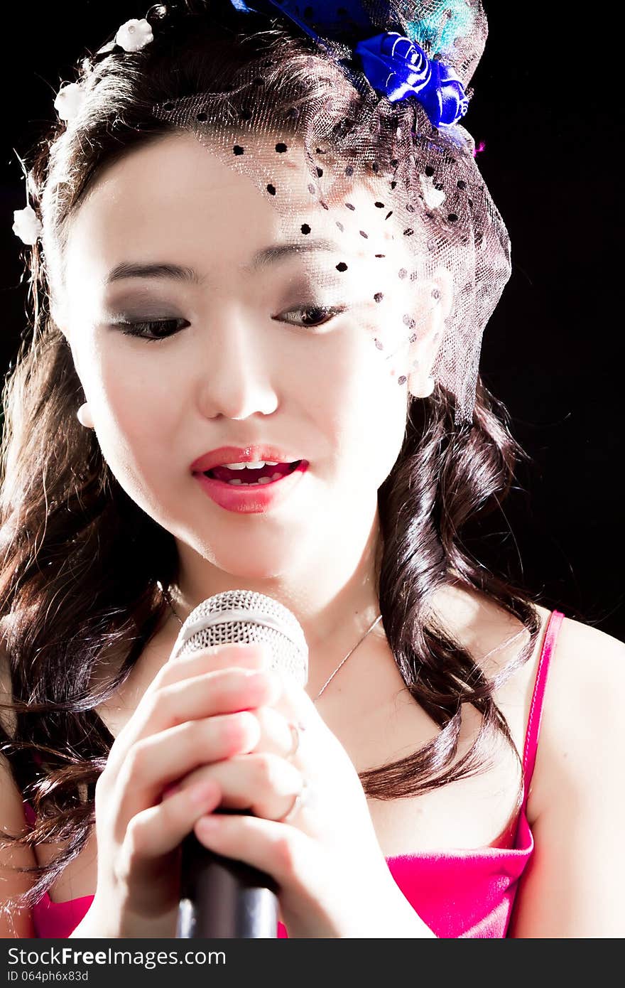 Concert young Asian singer of the girl. Concert young Asian singer of the girl