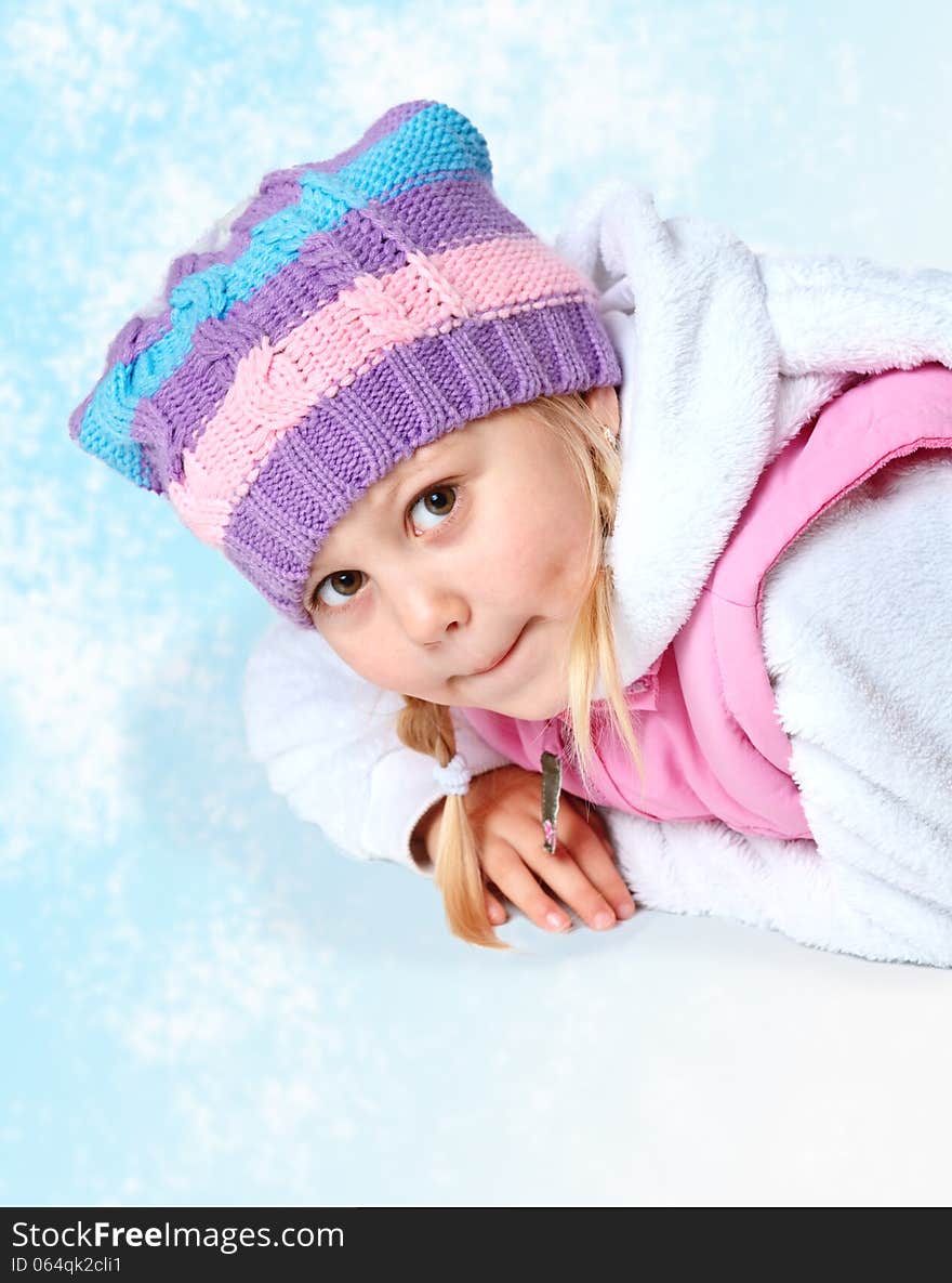 Portrait of a little girl wearing a scarf, christmas, winter, frost