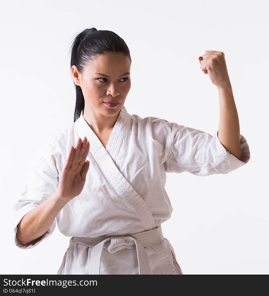 Asian woman in kimono show block in martial art exercise. Asian woman in kimono show block in martial art exercise