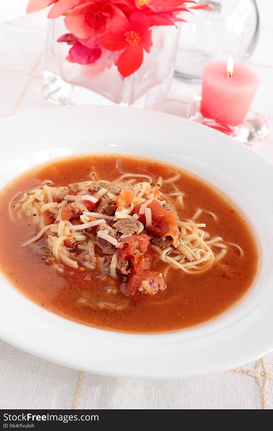 Tomatoe, beef and noodle soup