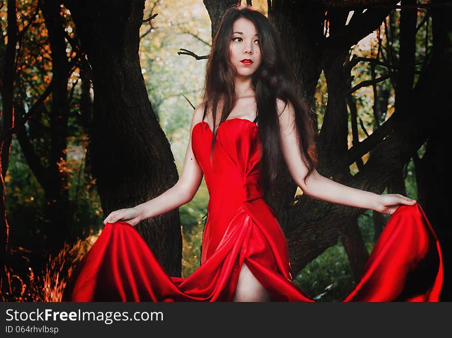 Beautiful girl in red dress