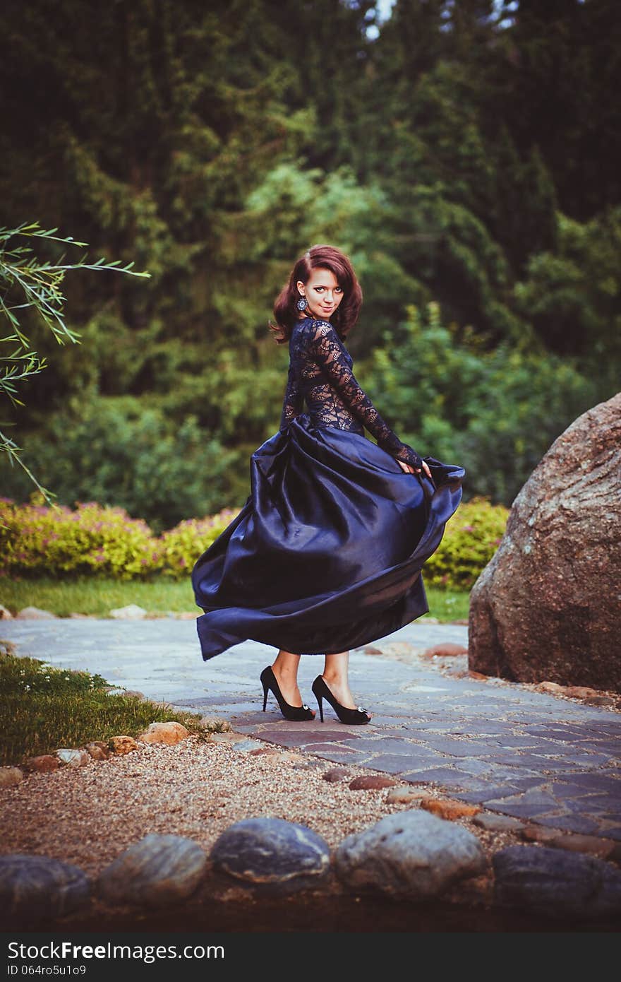 Passionate girl dancing in dress