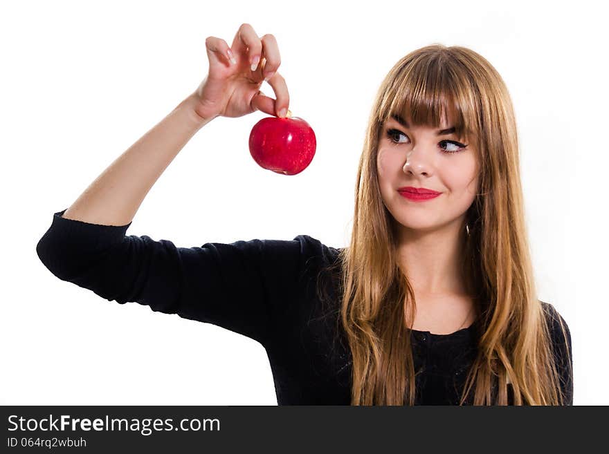 The pretty, young Girl and red apple. Isolated on white.