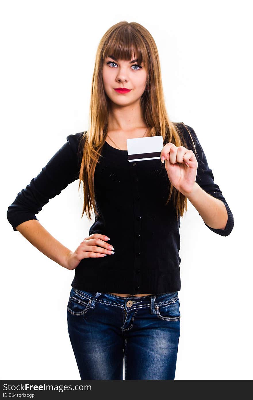 The pretty, young girl holds out business card. Isolated on white.