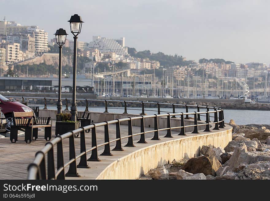 Embankment city of Tarragona in fine morning. Spain. Embankment city of Tarragona in fine morning. Spain.