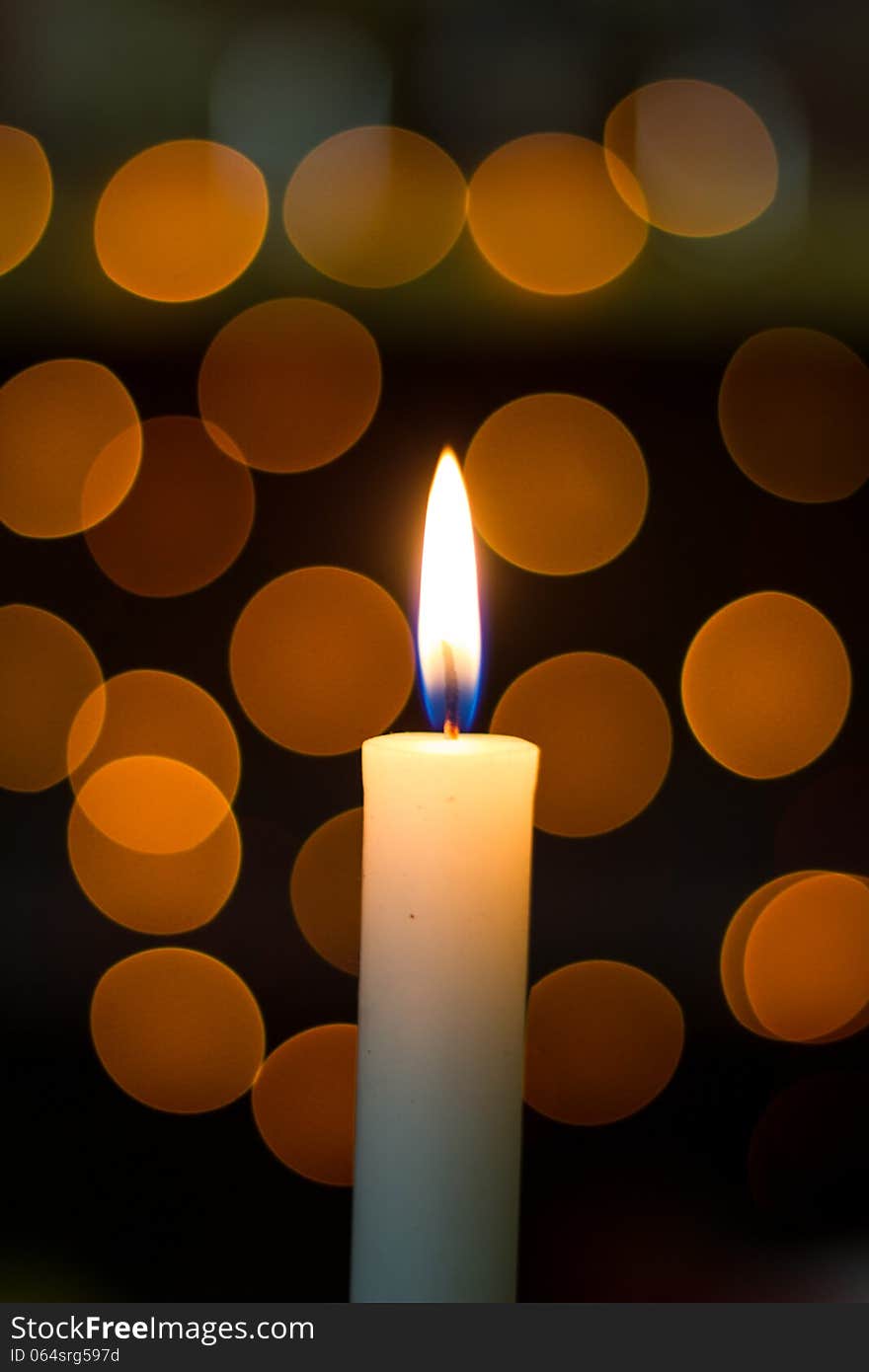 Glowing candle with background as bokeh. Glowing candle with background as bokeh