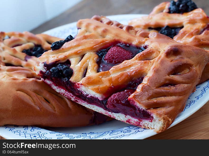 Berry pie on a plate closeup