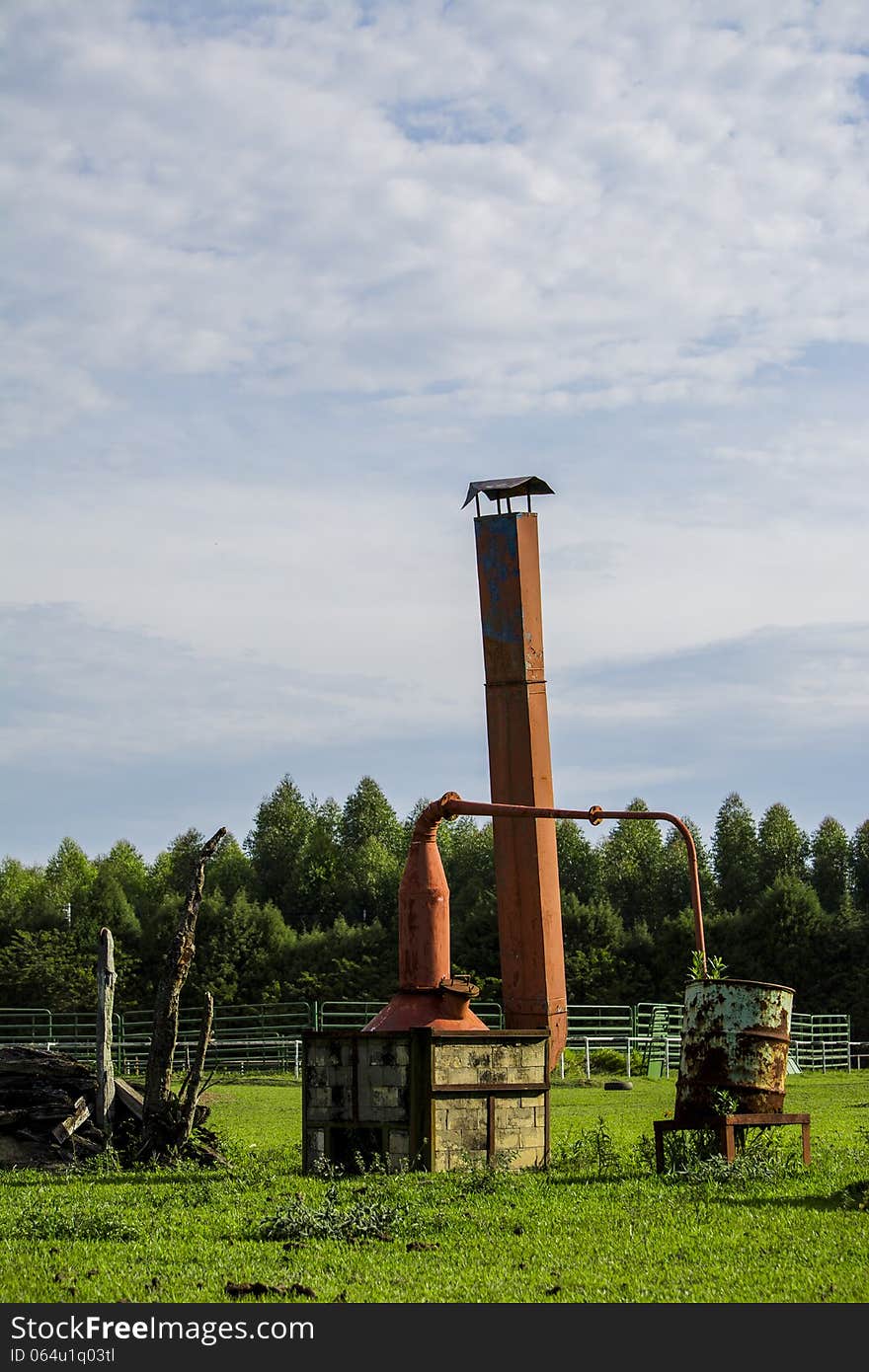 Old distiller on a farm