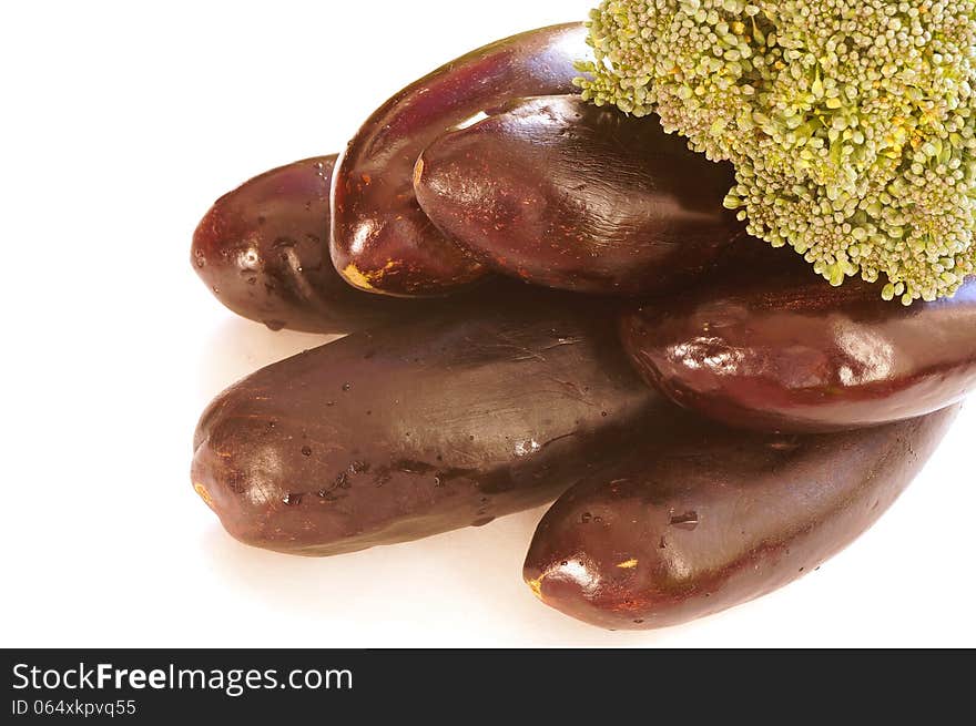 Group eggplant on a white background in the corner of the image. Group eggplant on a white background in the corner of the image