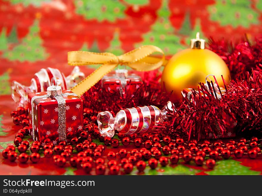 Red Christmas toys on a red background. Red Christmas toys on a red background