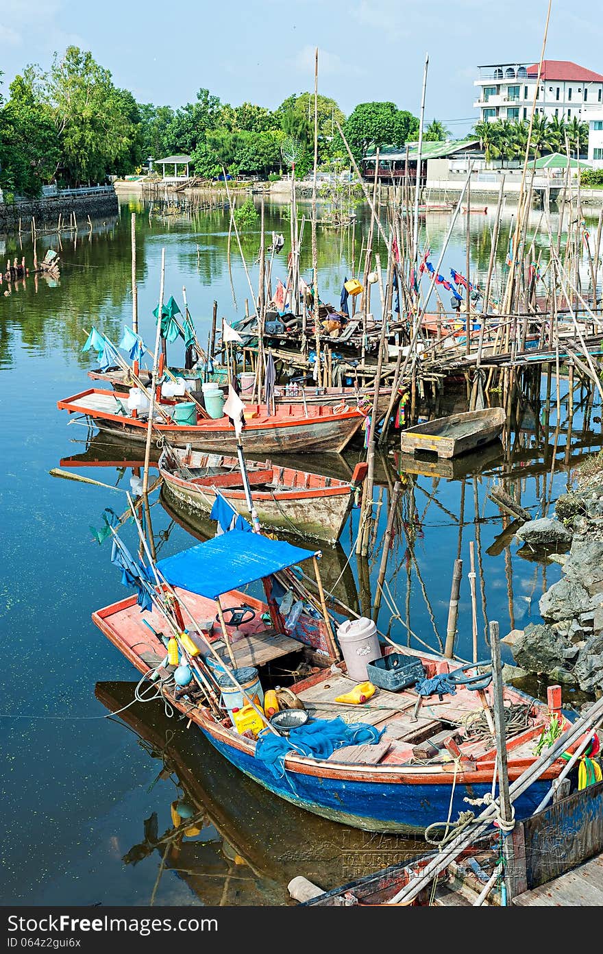 Fishing village asian style in blue sky .