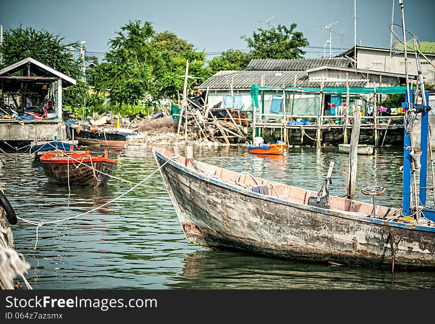 Fishing village asian style in blue sky .