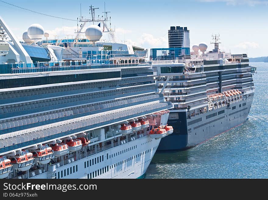 Two cruise ships anchored in the port of Ketchikan, Alaska. Two cruise ships anchored in the port of Ketchikan, Alaska