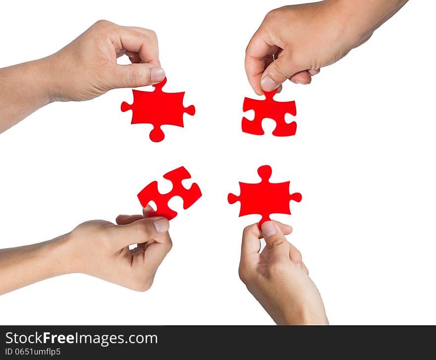 Hands and puzzle isolated on white background