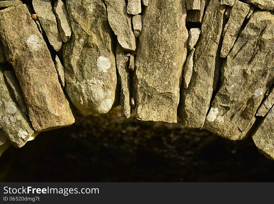 Background on the old stone bridge in closeup