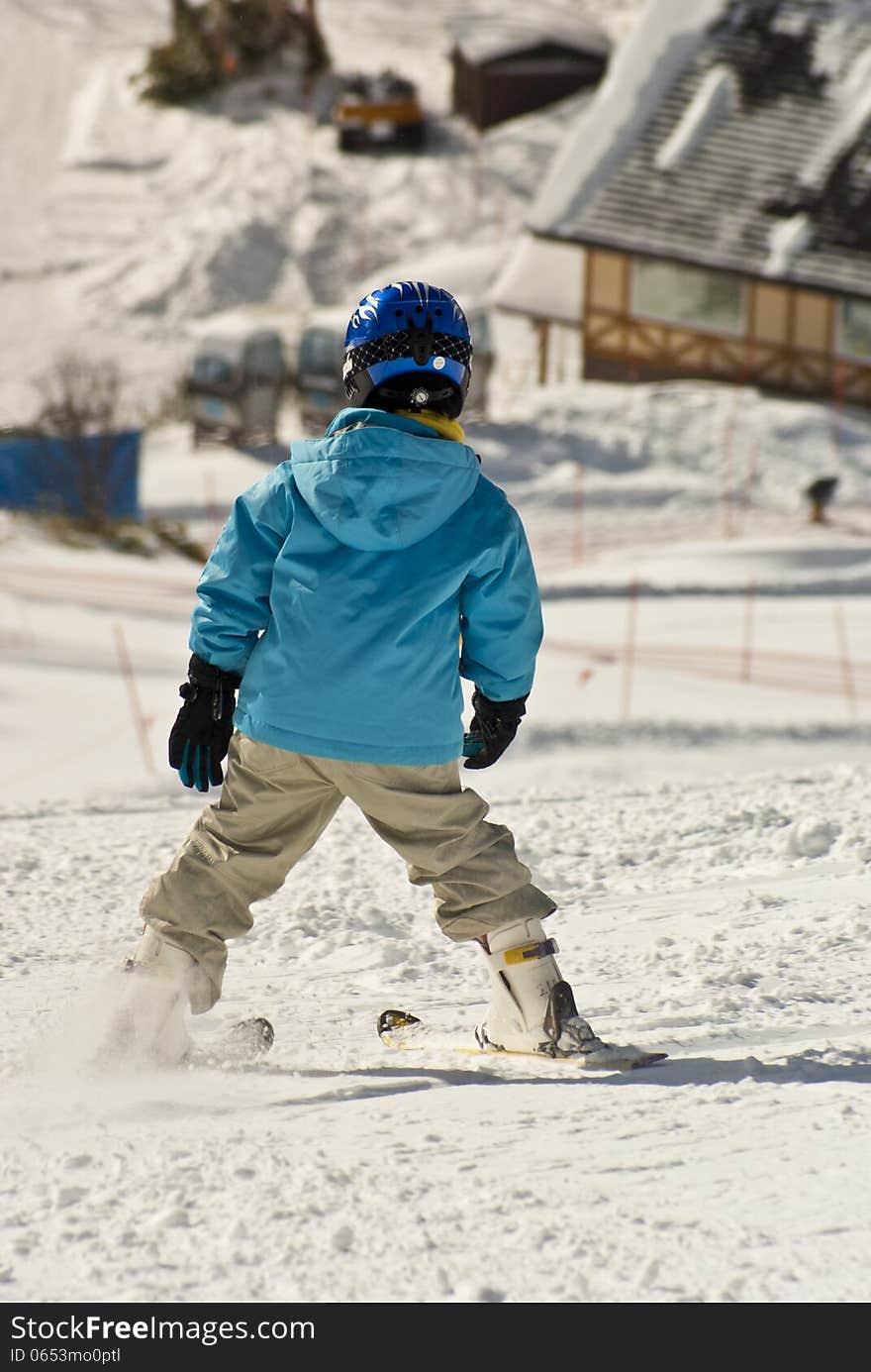 Small feet learning to balance on snow. Small feet learning to balance on snow