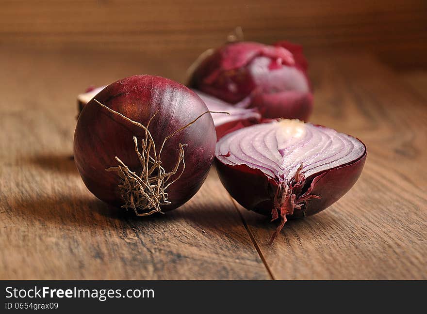 Red Onion On Wood