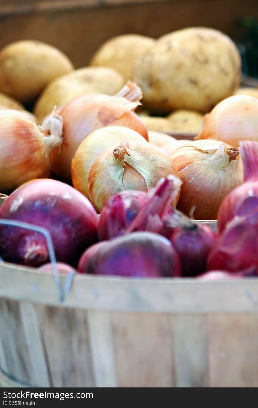 Variety of onions in baskets. Variety of onions in baskets.