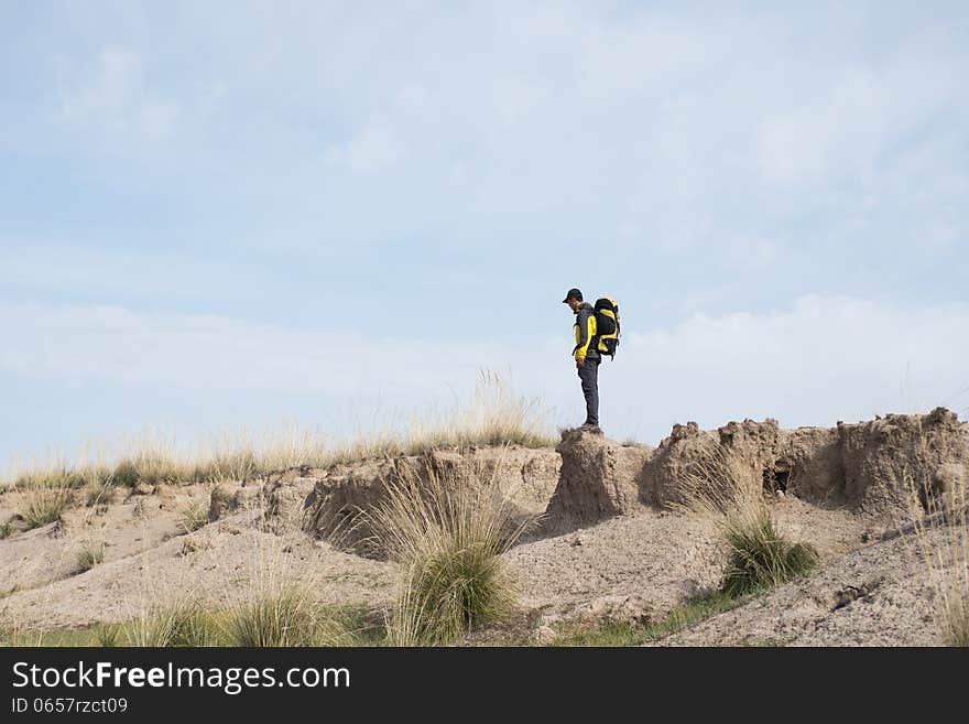 Hikers walking in a steep hill. Asian Youth. Hikers walking in a steep hill. Asian Youth