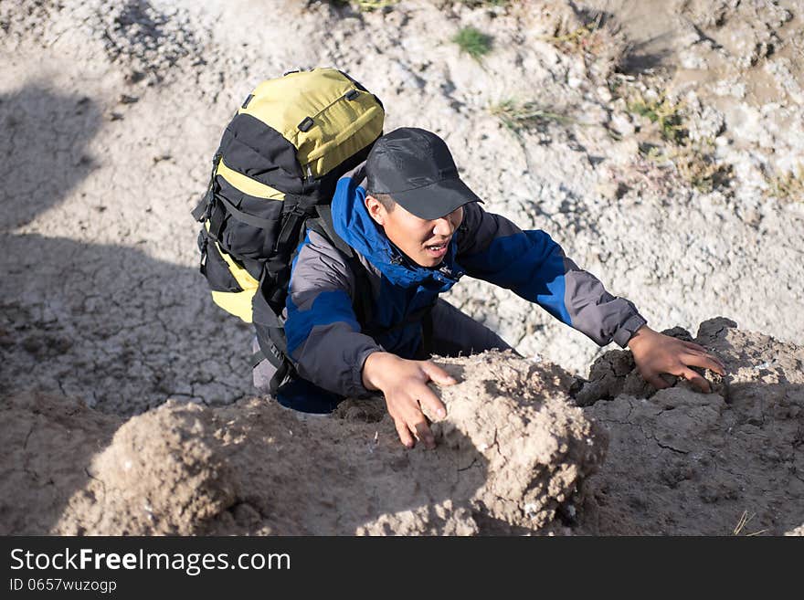 Hikers climbing steep slopes. high angle shot. Hikers climbing steep slopes. high angle shot