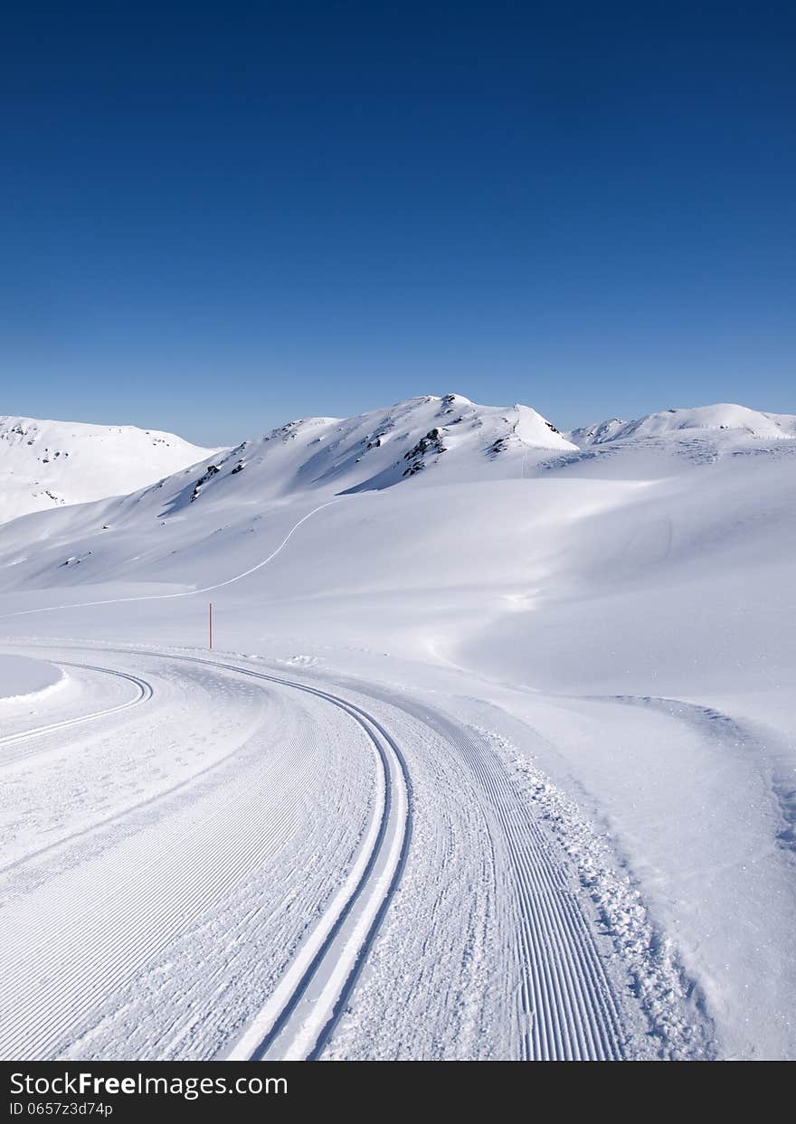 Winter hiking and langlauf trail in the alps