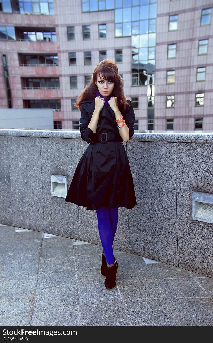 Lonely Girl Standing On Grey Street