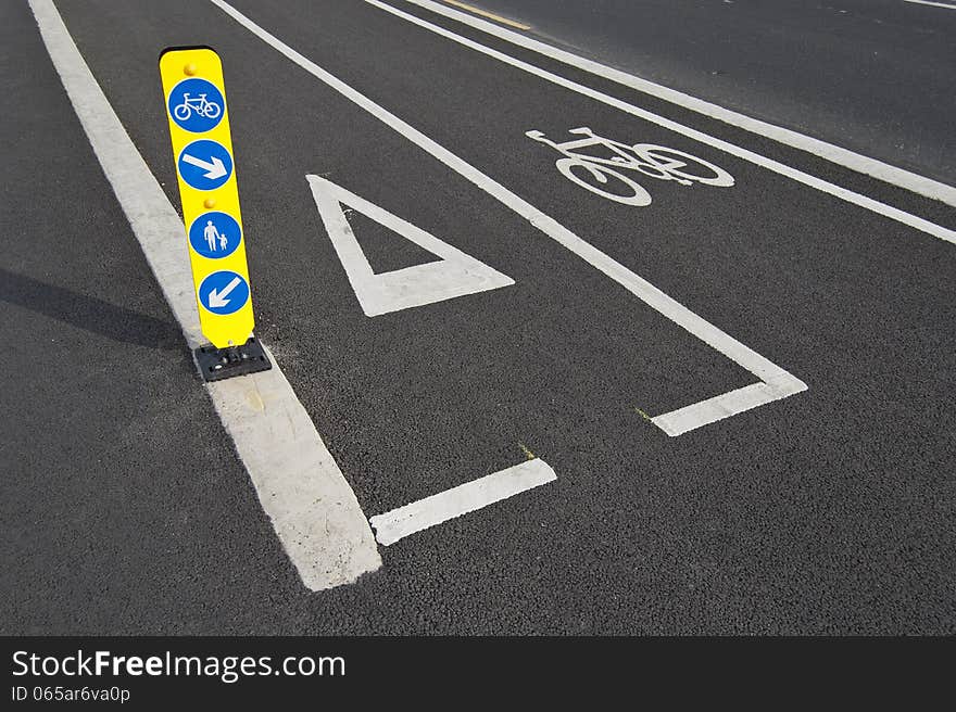 Bicycle lane road sign with give way sign and pedestrian signpost. Bicycle lane road sign with give way sign and pedestrian signpost