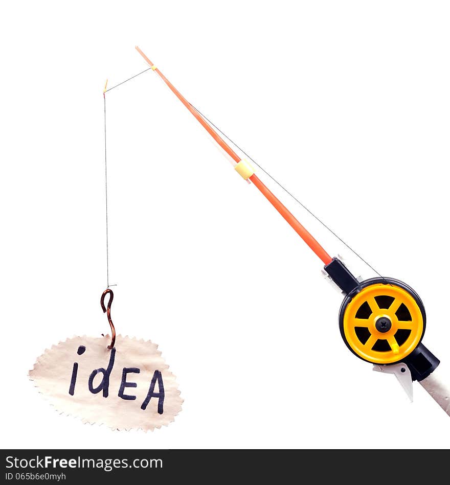 Fishing rod with a hook on wearing the piece of paper with the word idea