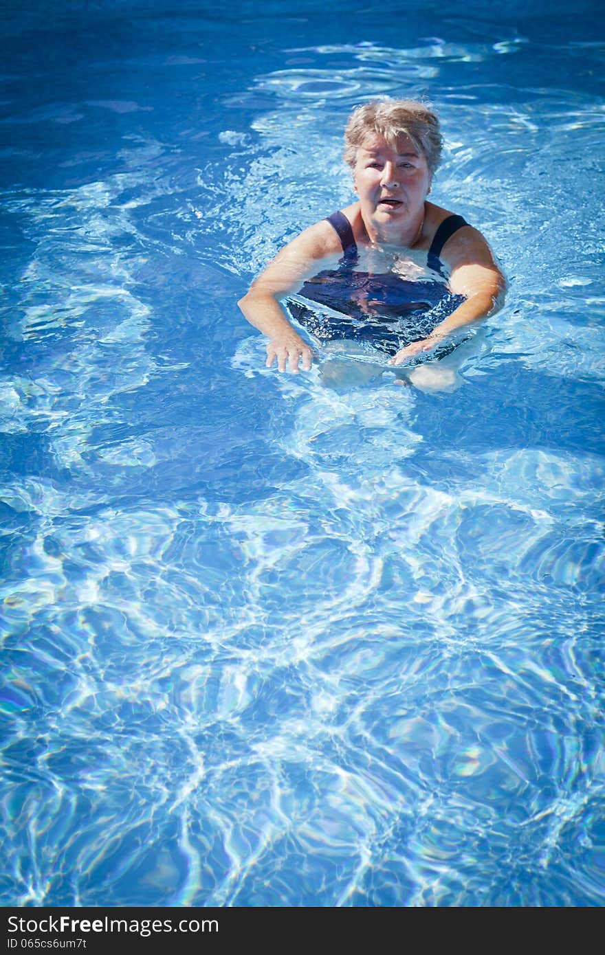 Senior Woman Swimming in the Pool