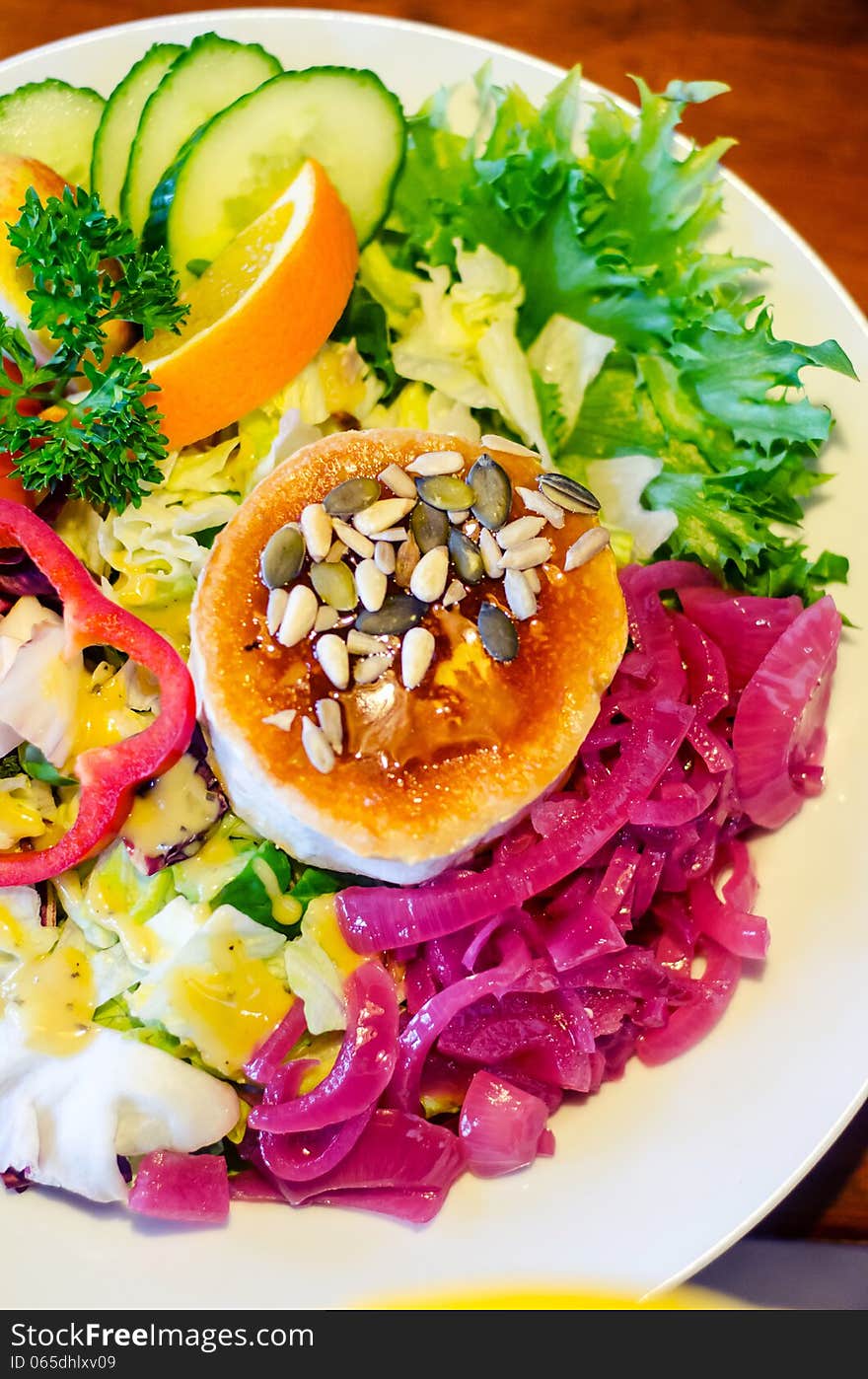 Baked goats cheese with vegetables- artificial light