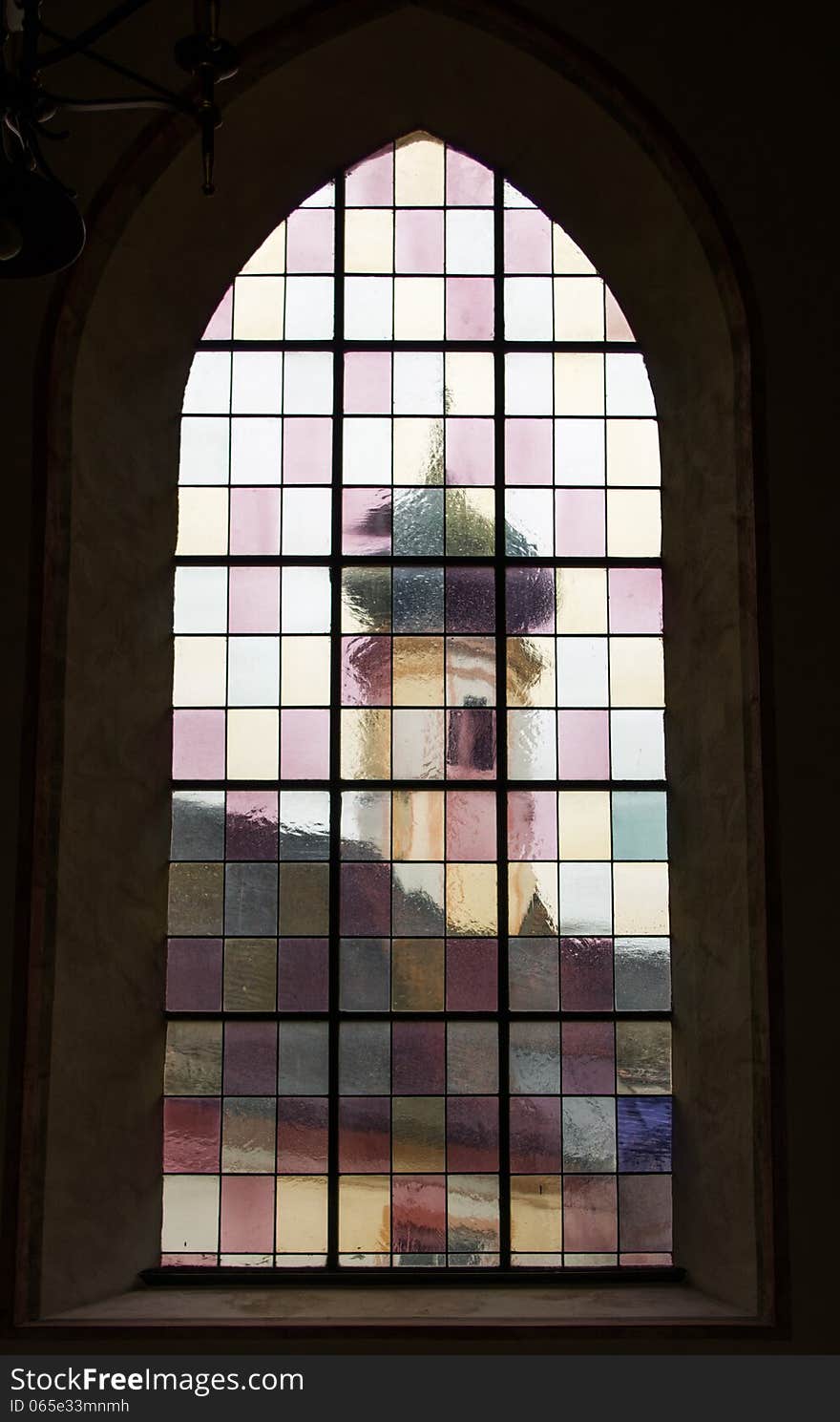 Stained glass window in the cathedral in the town of Kufstein, close to the fortress