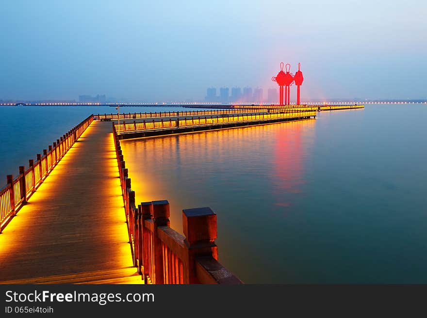 Golden brown wooden trestle and chinese knot