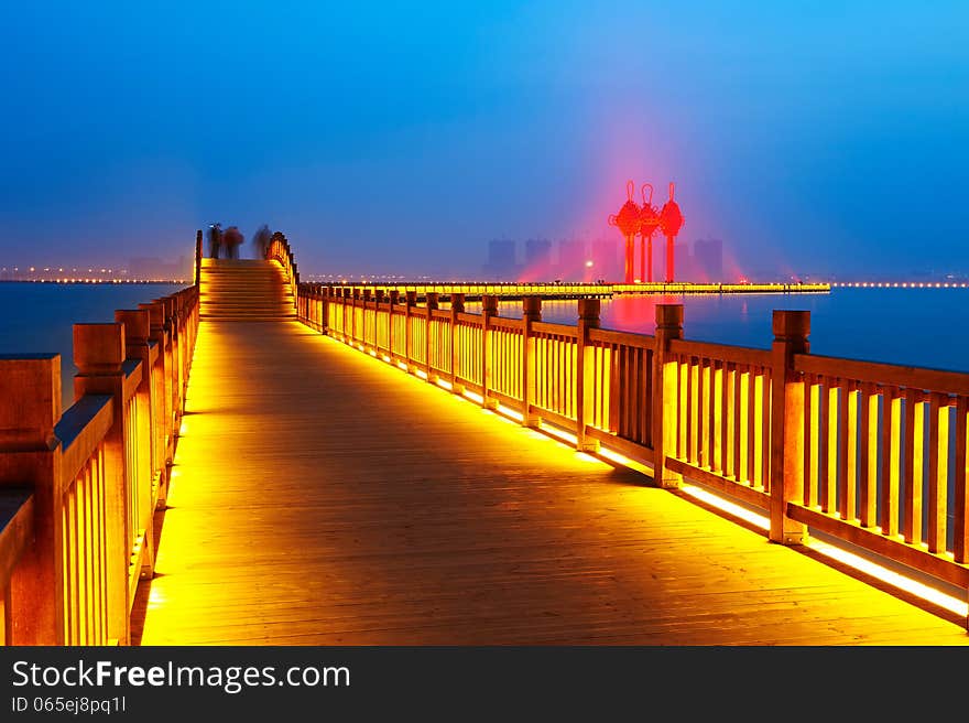 Golden Brown Wooden Trestle And Chinese Knot Which Red Light Shine