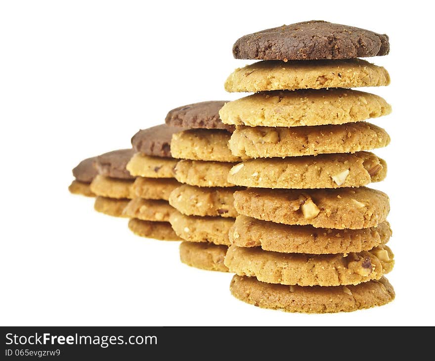 Perspective of cookie stack chart with brown cookie on top on white background. Perspective of cookie stack chart with brown cookie on top on white background