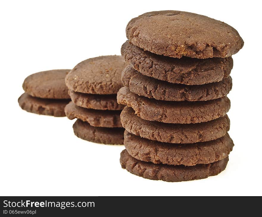 Perspective of three step stack of chocolate cookie on white background. Perspective of three step stack of chocolate cookie on white background