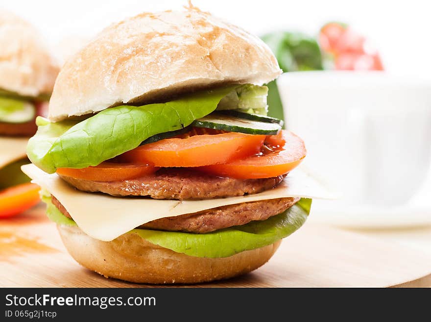 Some sandwiches on cutting board