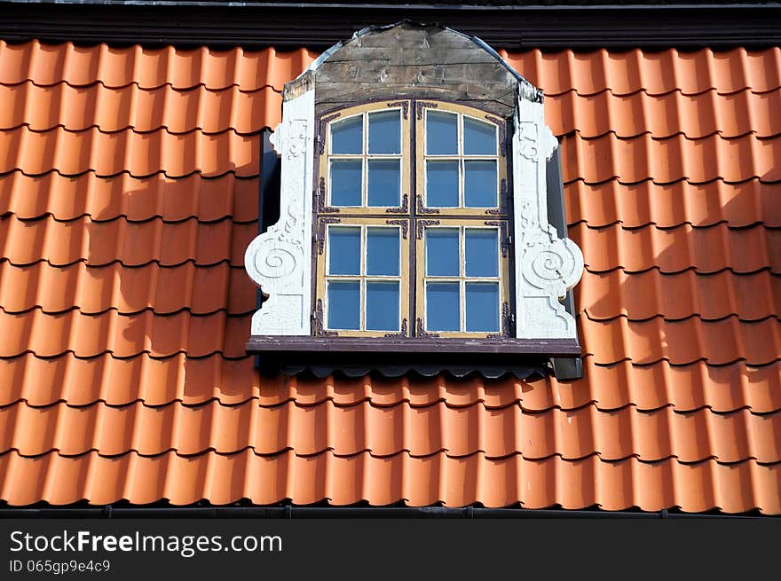 Dormer roof window, in a tiled roof. Dormer roof window, in a tiled roof