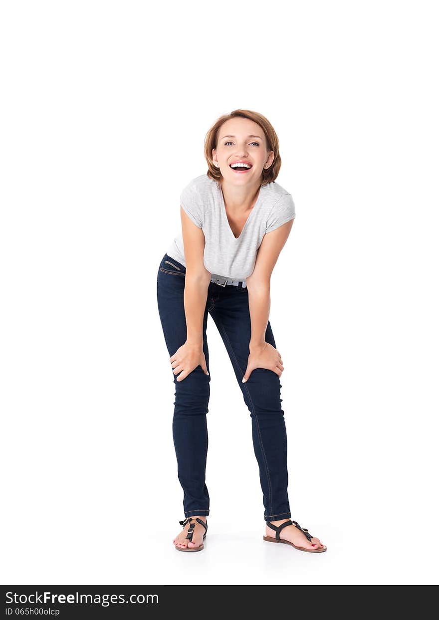 Full portrait of the beautiful happy woman stands at studio on white background. Full portrait of the beautiful happy woman stands at studio on white background