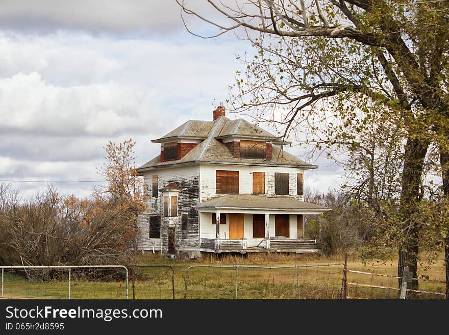 An old multi roofed white house