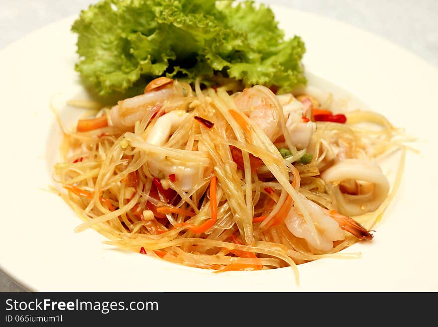 Som Tam (Green Papaya Salad) is a very popular traditional and modern thai food